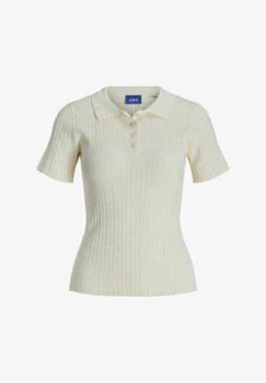 Geribbelde crèmekleurige polo met een kraag, korte mouwen en een ruime knoopsluiting met drie knopen. Gemaakt van een rekbare, gestructureerde stof.