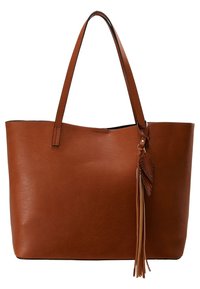 Bruine leren draagtas met een gladde textuur, voorzien van lange handvatten en een decoratieve kwast met bladvormen.