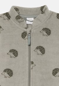 Hedgehog-patterned grey fleece jacket with a zip closure and a soft texture. Features a stand collar and small hedgehog illustrations.