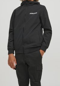 Jack & Jones Junior JJERUSH BLOCKING NOOS JNR - Allvädersjacka - black