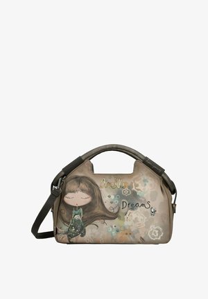 Sac à main synthétique texturé aux tons bruns atténués, avec une illustration de fille en dessin animé, le texte "Anekke Dreams" et des accents floraux.