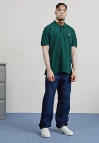 Carhartt WIP CHASE - Polo - chervil/gold