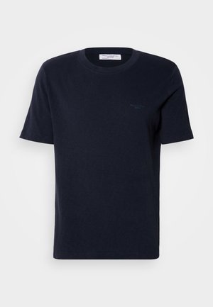 Navy blue cotton t-shirt with short sleeves, round neckline, and small logo detail on the chest. Smooth texture, classic fit.