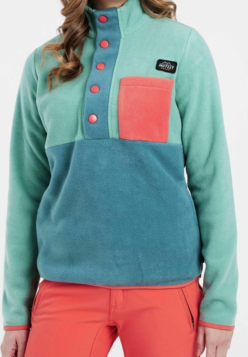 Fleecowy pulower w kolorze teal i miętowym, z koralową kieszenią na piersi, pięcioma kontrastującymi guzikami i wysokim kołnierzem.