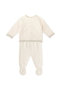 Conjunto para bebé de color crema, que incluye una camiseta de manga larga con puntos texturizados y pantalones con pies a juego, adornados con un ribete gris.