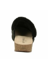 Schwarzer Slipper mit einem weichen, samtigen Obermaterial und einer Korkzwischensohle. Besitzt eine abgerundete Form und eine flache Sohle, die für Komfort ausgelegt ist.