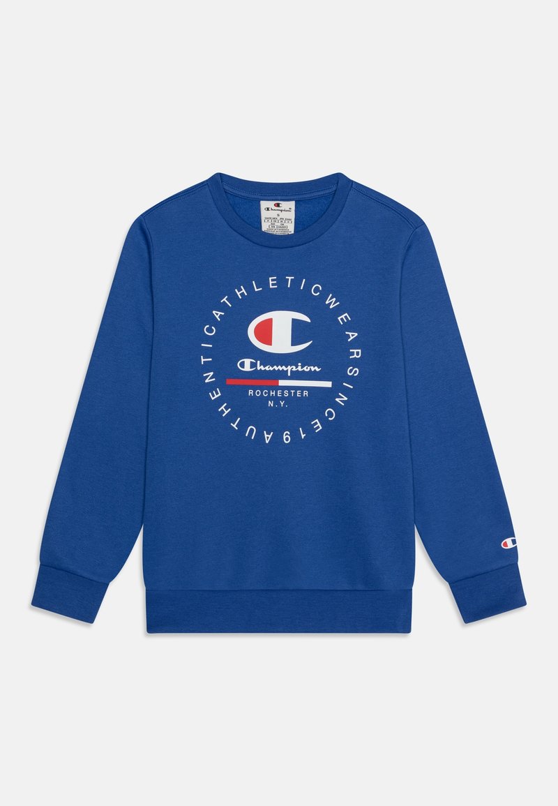Sudadera azul de tejido suave, presenta un logo circular en blanco y rojo. Incluye mangas largas y un cuello y puños de canalé.