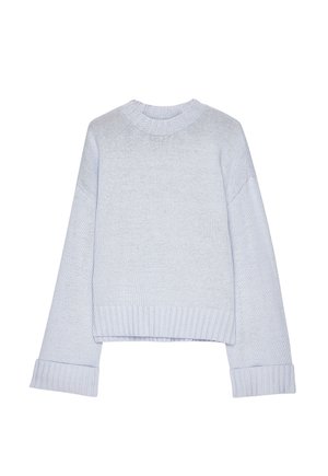 Light gray knitted sweater with long, slightly flared sleeves and ribbed cuffs, hem, and crew neckline.