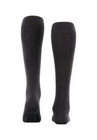 Calze nere al ginocchio con una texture liscia, un motivo a maglia uniforme, punta rinforzata e un marchio discreto sulla suola.