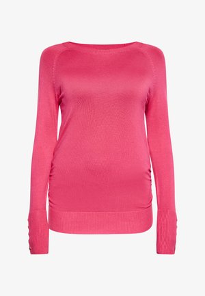 Maglione rosa a maniche lunghe con scollatura rotonda, polsini a coste con bottoni decorativi e dettagli arricciati sui lati. Materiale morbido e elasticizzato.