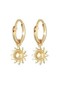 Guld hoop øreringe med solstråle charms, der har en central perle. Glat overflade, rund form og indviklede blomst-lignende detaljer.