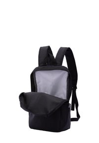 Black backpack with padded shoulder straps, zip closure, and a solid, textured exterior. Features a gray interior and flap pocket.