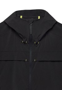 Black jacket with a high collar, zipper front, and dual drawstrings. Features yellow accents and a smooth, lightweight texture.