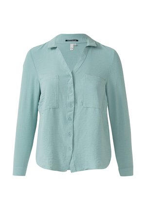 Lichtblauwe lange mouwen knoopshirt, met een V-hals, twee borstzakken en een geweven stof met een subtiele krinkeling.