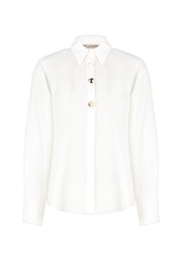 Camicia bianca con colletto, caratterizzata da una fila di bottoni circolari sul davanti. Realizzata in tessuto leggero con maniche lunghe.
