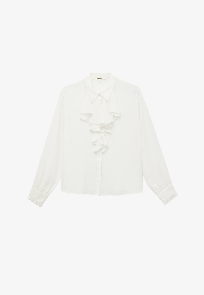 Hvid bluse med rynket front, lange ærmer med rynkede manchetter og klassisk krave. Lavet af glat stof, med knaplukning.