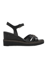 Black wedge sandals featuring cross straps, a textured heel, and adjustable ankle strap. Made of leather with contrasting sole accents.