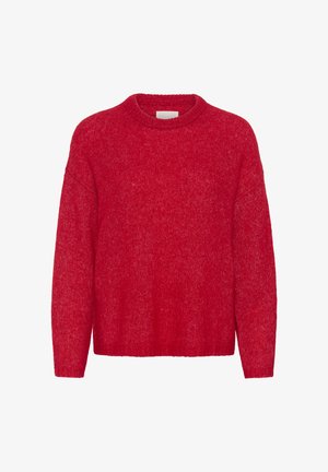 Piros kötött pulóver kerek nyakkivágással, leengedett vállakkal és laza szabással. Az anyag texturált, kissé bolyhos megjelenésű.