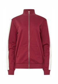 Giacca a zip color bordeaux con colletto alto, pannelli laterali color crema, due tasche frontali, polsini e orlo a coste, realizzata in morbido tessuto misto cotone.