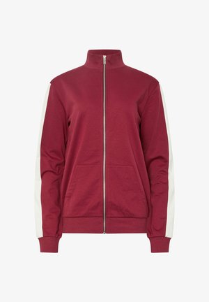 Bordowa kurtka zapinana na zamek z wysokim kołnierzem, kremowe panele boczne, dwie przednie kieszenie, ściągacze u rękawów i u dołu, wykonana z miękkiej mieszanki bawełny.