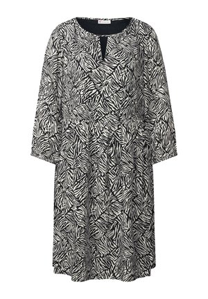 Mustavalkoinen mekko, jossa on seepra kuvio, 3/4-hihat, pyöreä kaula-aukko avauksella ja rento malli.