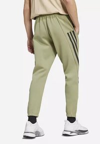 adidas Performance FUTURE ICONS  - Donji dijelovi trenirke - groen