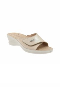 Sandalo con zeppa beige, con punta aperta e design a strappo incrociato, realizzato in materiale sintetico, dotato di superficie testurizzata e soletta imbottita.