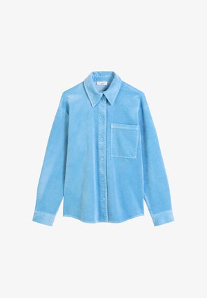 Blue corduroy shirt with long sleeves, button closure, pointed collar, and a single front pocket. Soft texture with vertical ridges.