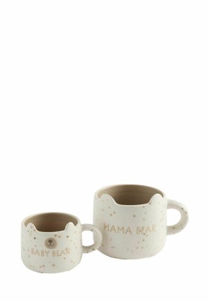 Two white ceramic mugs with brown speckles, shaped like bear faces, labeled "BABY BEAR" and "MAMA BEAR" with matching ears on the rims.