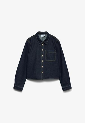 Tumesinise teksariidest jakk pikkade varrukatega, ees nööpidega, terava krae ja ühe rinnataskuga, millel on kontrastõmblused.