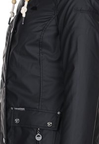 Schmuddelwedda Parka - black