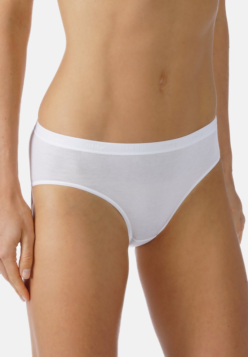 Slip bianco in cotone con una texture liscia, taglio a vita bassa e morbido cinturino elastico con un logo discreto.