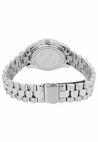 Silberner Edelstahluhren mit einem Gliederarmband, runder Gehäuseform und polierter Oberfläche. Verfügt über einen sicheren Verschluss und ein minimalistisches Design auf der Rückseite.