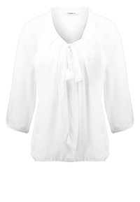 White long-sleeve blouse with a V-neck, gathered front, and a tied bow detail at the neckline.
