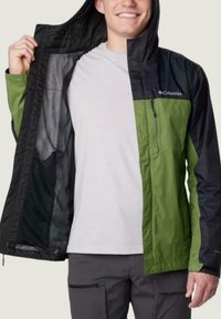 Columbia-Jacke mit einem grün-schwarzen Farbblockdesign. Mit Reißverschluss vorne, Netzfutter, Kapuze und verstellbaren Bündchen. Maschinenwaschbarer Stoff.