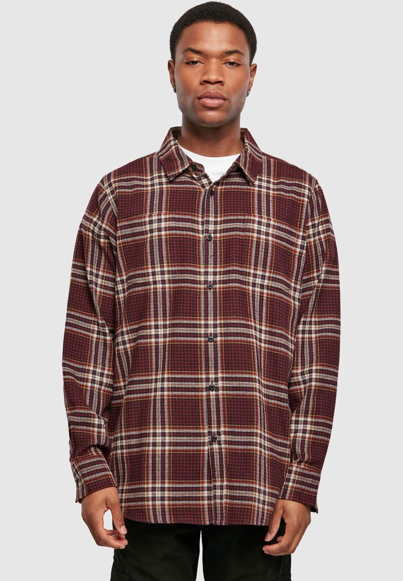 Flanellhemd in Burgunderrot, Schwarz und Beige mit Karo-Muster, langen Ärmeln, Knopfleiste vorne und lockerer Passform. Verfügt über einen klassischen Kragen.