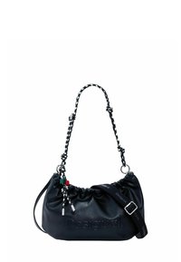 Mustmust mustraha, millel on tõmbluku sulgemine, must-valge punutud rihm ja dekoratiivsed kaunistused. Ees on reljeefne logo.