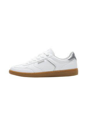 Low-profile white leather sneaker with brown rubber sole, white laces, and silver detail on the heel and side tag, isolated on white background.