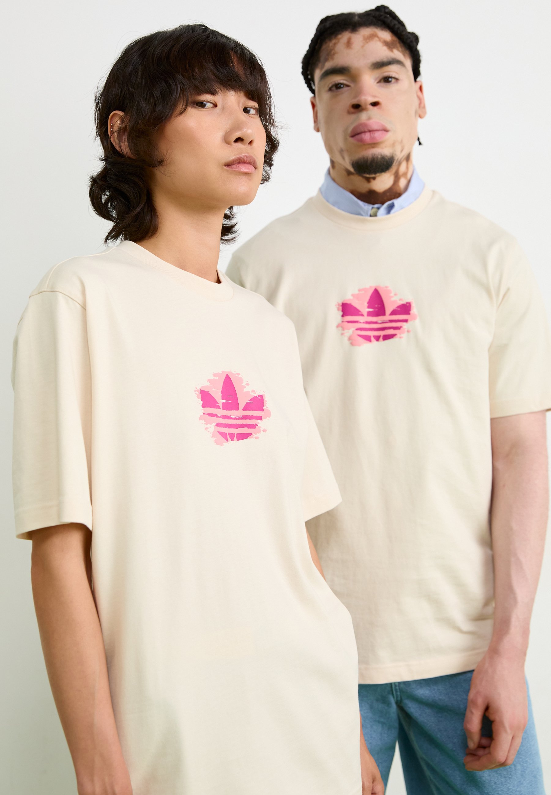 white and pink adidas t shirt