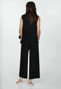 Mango Pantaloni - black
