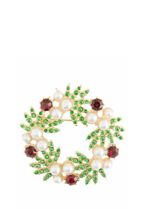 Gold wreath brooch with green crystals, clusters of white pearls, and red gemstone accents on a white background.