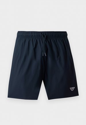 Sorte herre badeshorts med elastisk talje, snøre og lille hvidt logo på venstre ben mod en hvid baggrund.
