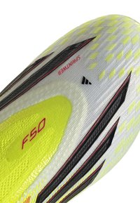 adidas Performance F50 ELITE LACELESS FIRM GROUND KIDS UNISEX - Μπότες ποδοσφαίρου για σταθερό έδαφος - team solar yellow 2/core black/lucid red