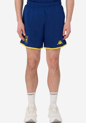 Pantaloni sportivi blu con bordini gialli e logo Kappa. Realizzati in tessuto leggero, con vita elastica e taglio corto.