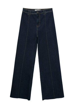Jean large en denim foncé, avec des coutures contrastantes, une fermeture à bouton et un design taille haute.