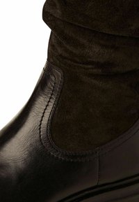 Marco Tozzi Bottes à plateau - black comb