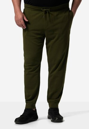 Olivgrüne Jogginghosen aus weichem Stoff, mit elastischem Bund und Kordelzug, schmal zulaufenden Beinen und Bündchen an den Knöcheln.
