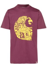 Czerwona koszulka z bawełny, z dużą żółtą grafiką z różnymi napisami i kształtami. Krótkie rękawy i okrągły dekolt.