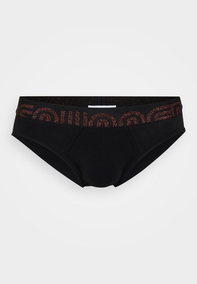 Schwarze Unterwäsche mit einem glitzernden Bund, der ein geometrisches Muster aufweist. Hergestellt aus glattem Stoff, verfügt sie über ein klassisches Slip-Design.