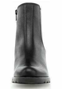 Botte chelsea noire en cuir avec une texture lisse, bout rond, fermeture éclair sur le côté et une semelle en caoutchouc durable avec un motif de semelle.